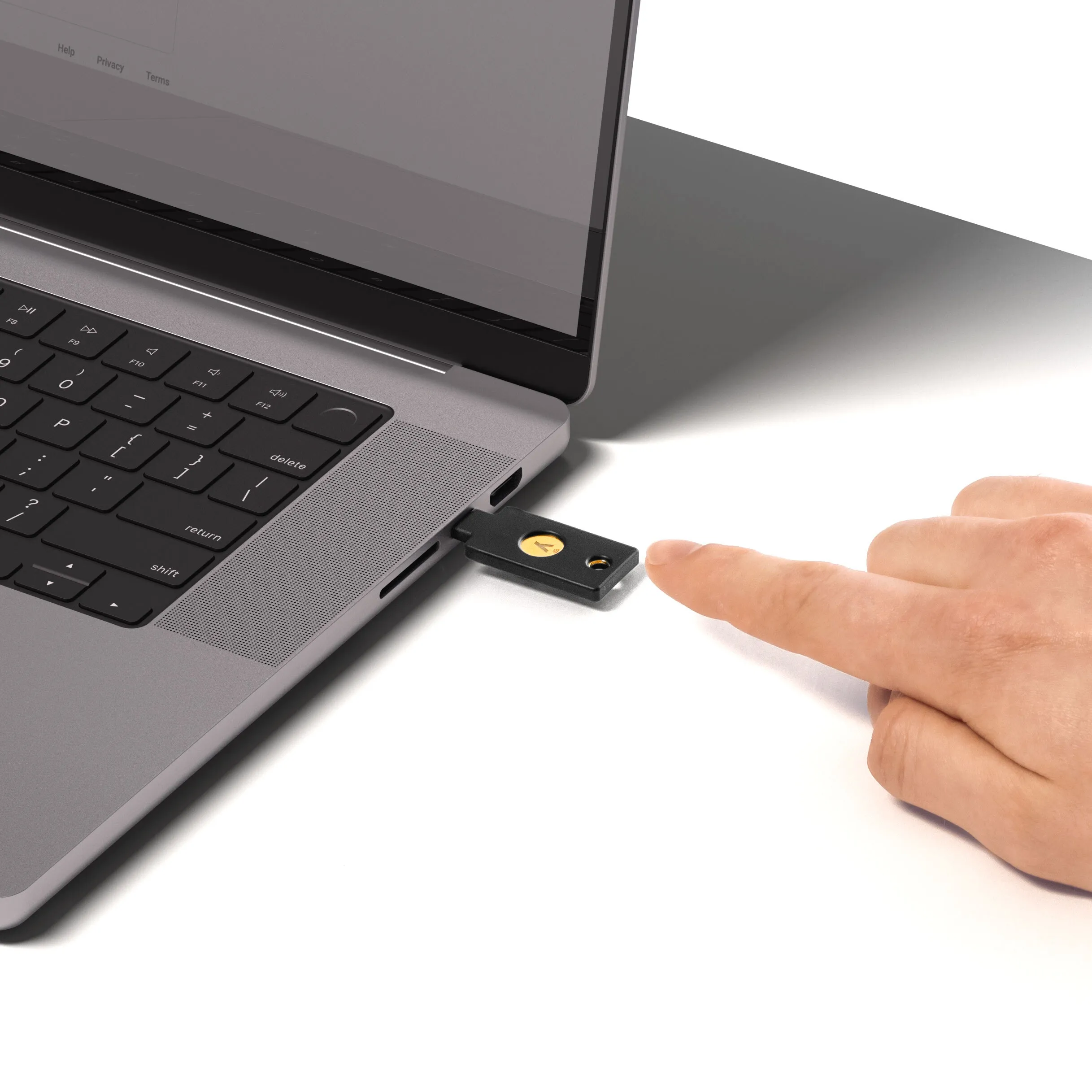 YubiKey 5C NFC, a USB-C security key roughly the size of a paperclip